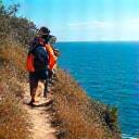 Adventurer Aisha Khan on a coastal hike